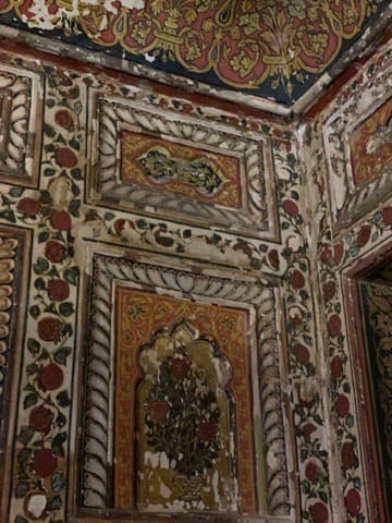 Carved and painted panel detail